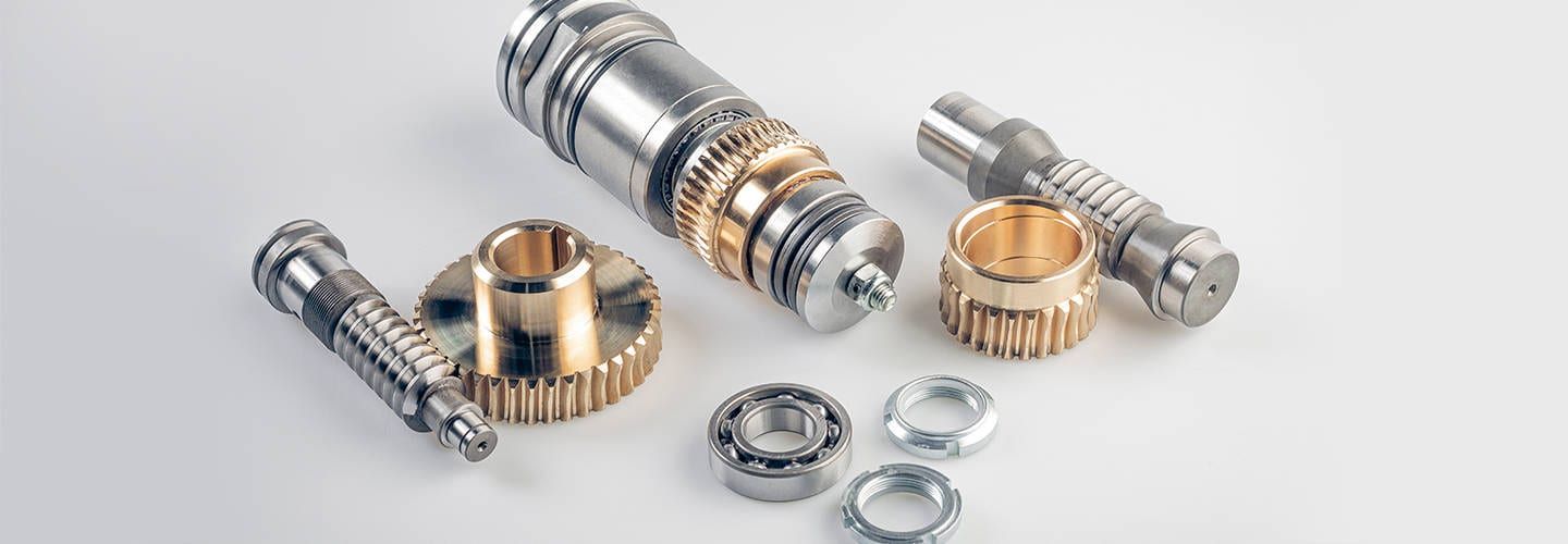 Precision gears and bearings on a white background